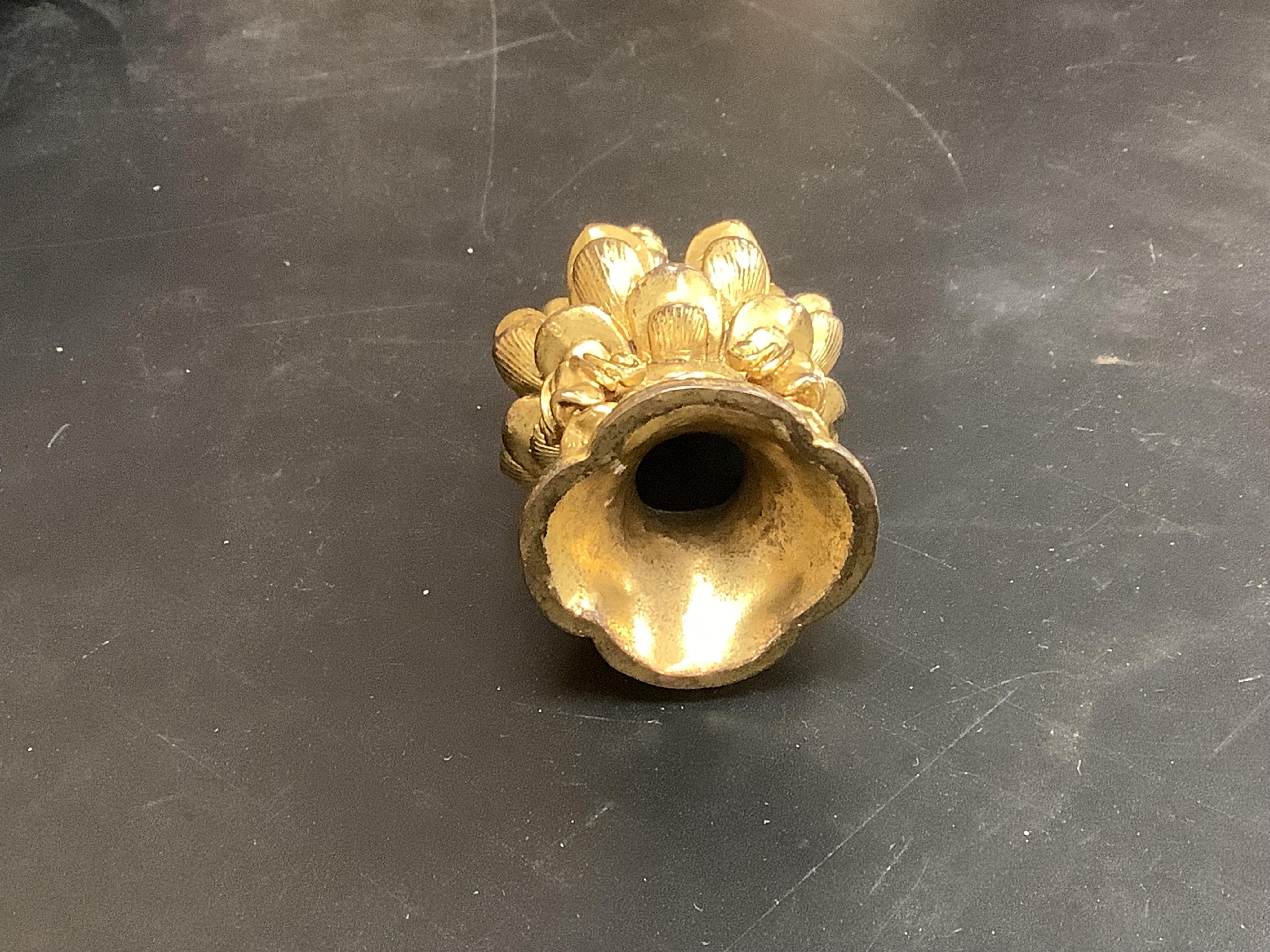 A Chinese miniature gilt metal figure of seated Buddha, 8cm high